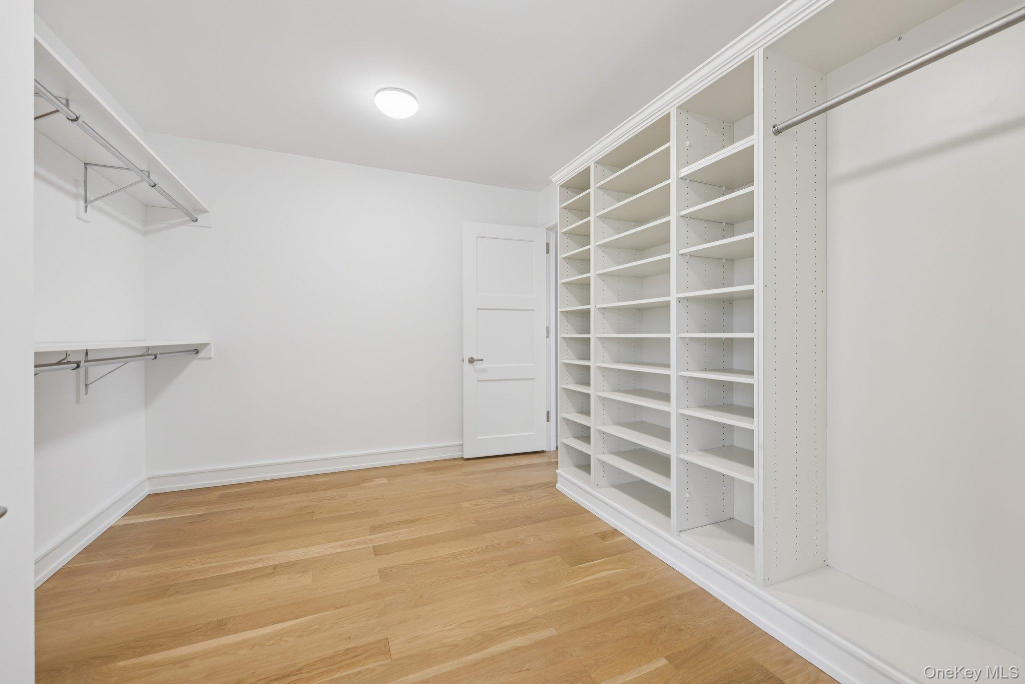 1 Renaissance Square, Unit PH40C White Plains, NY 10601 - Photo 13 of 25 Spacious closet featuring light wood-type flooring