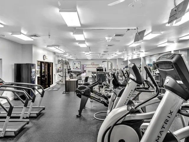 a view of a room with gym equipment
