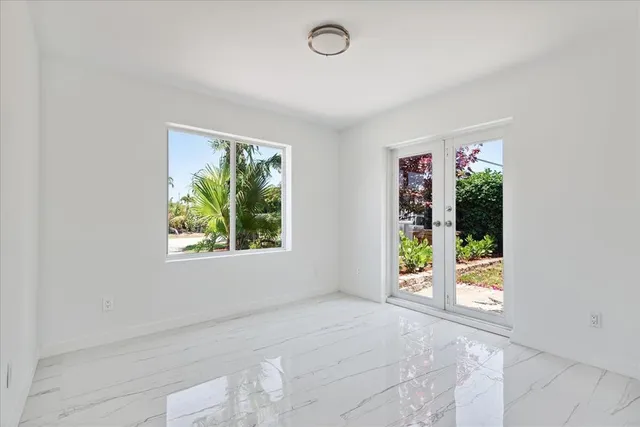 an empty room with windows