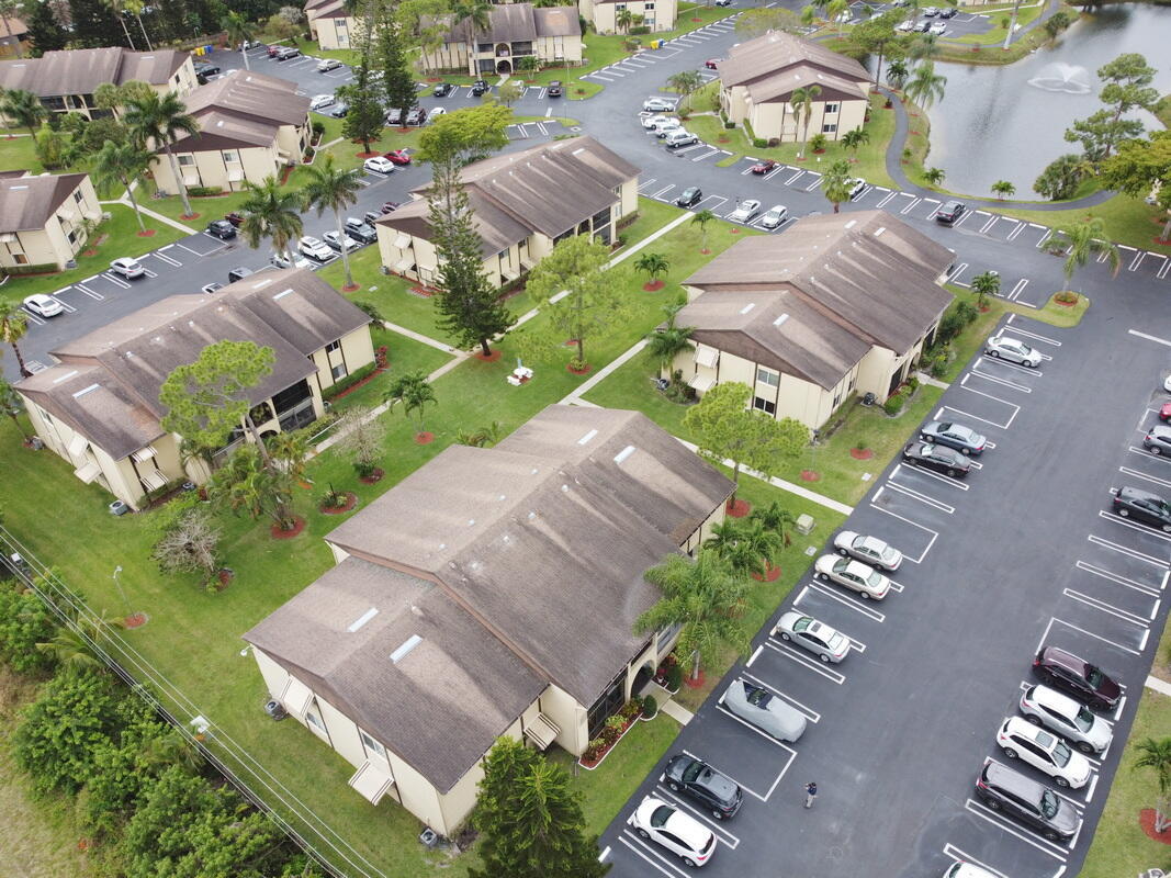 320 Pine Ridge Circle, Unit A1 Greenacres, FL 33463 - Photo 36 of 65 an aerial view of a house