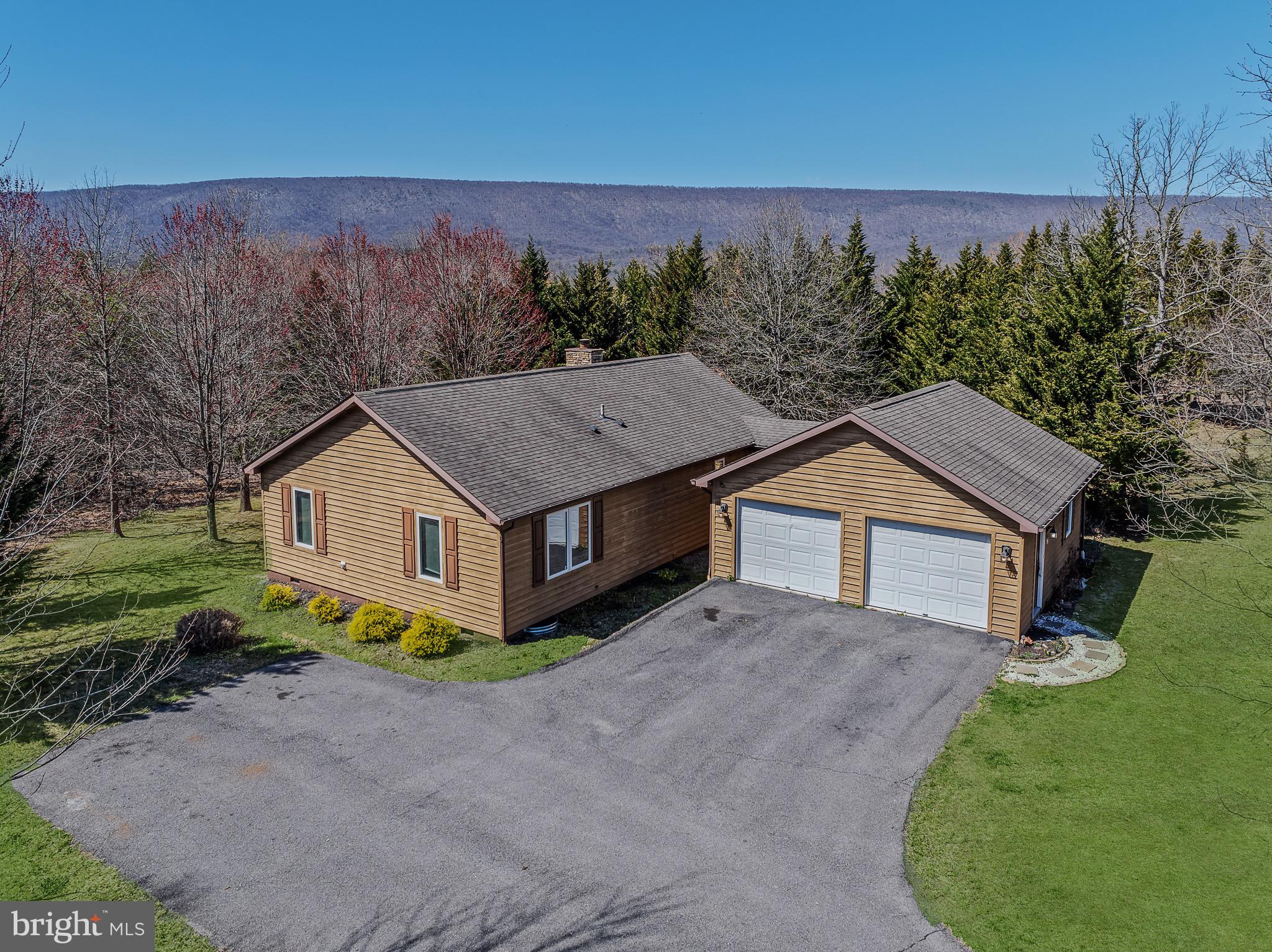 72 Medfords Lane Berkeley Springs, WV 25411 - Photo 1 of 52 front view of a house with a yard