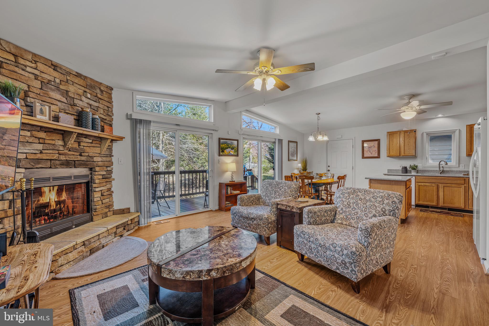 72 Medfords Lane Berkeley Springs, WV 25411 - Photo 13 of 52 a living room with furniture and a fireplace