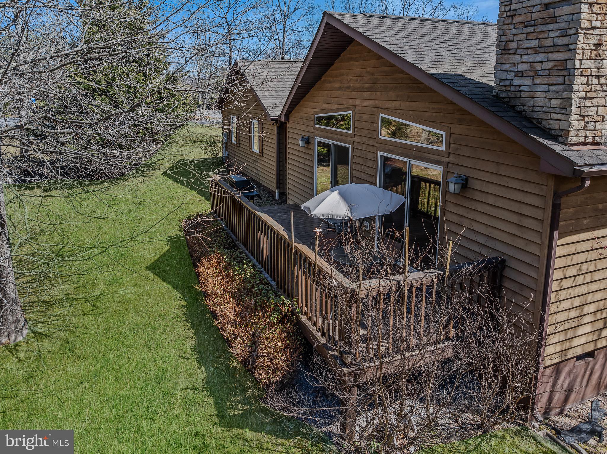 72 Medfords Lane Berkeley Springs, WV 25411 - Photo 32 of 52 a table and chairs in the patio