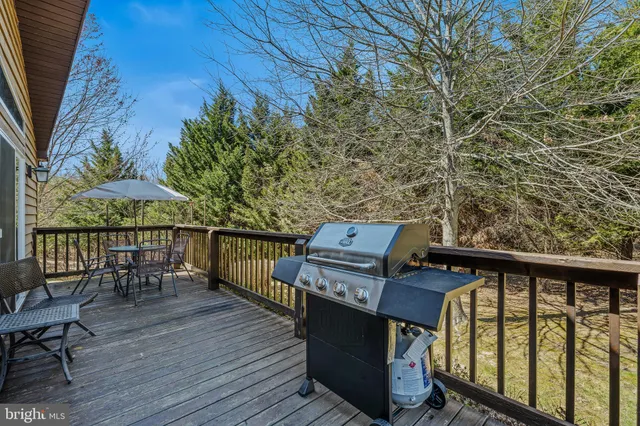 a view of a balcony with chairs