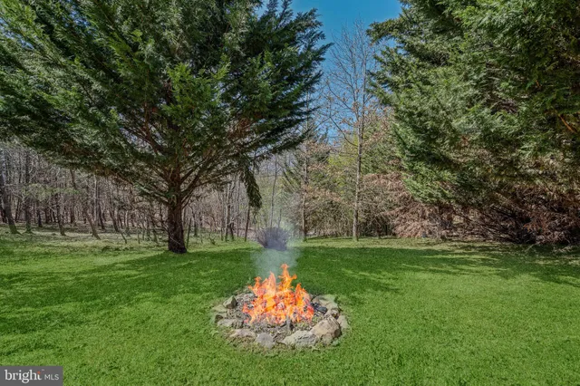 a backyard of a house with seating space