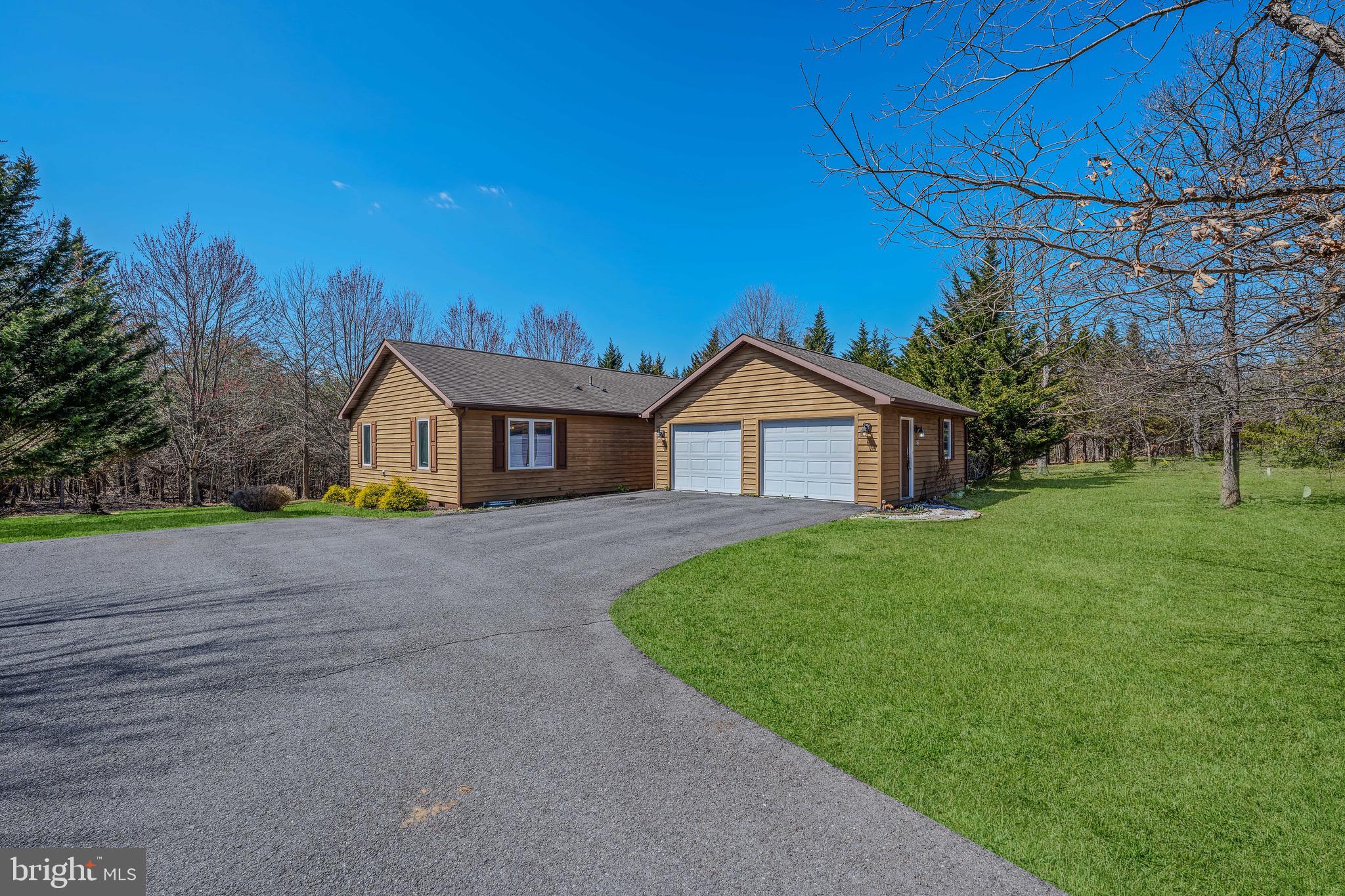 72 Medfords Lane Berkeley Springs, WV 25411 - Photo 39 of 52 a front view of house with yard and green space