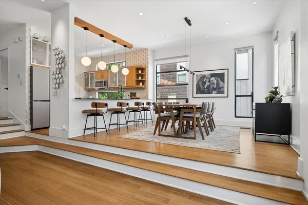 a view of a dining room with furniture