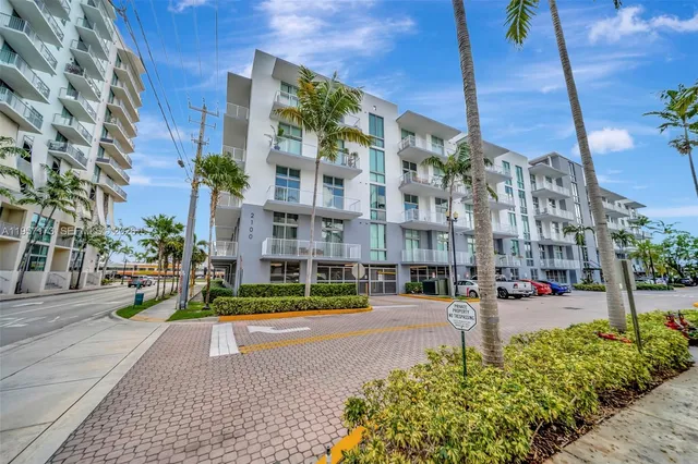 a view of tall buildings with a street