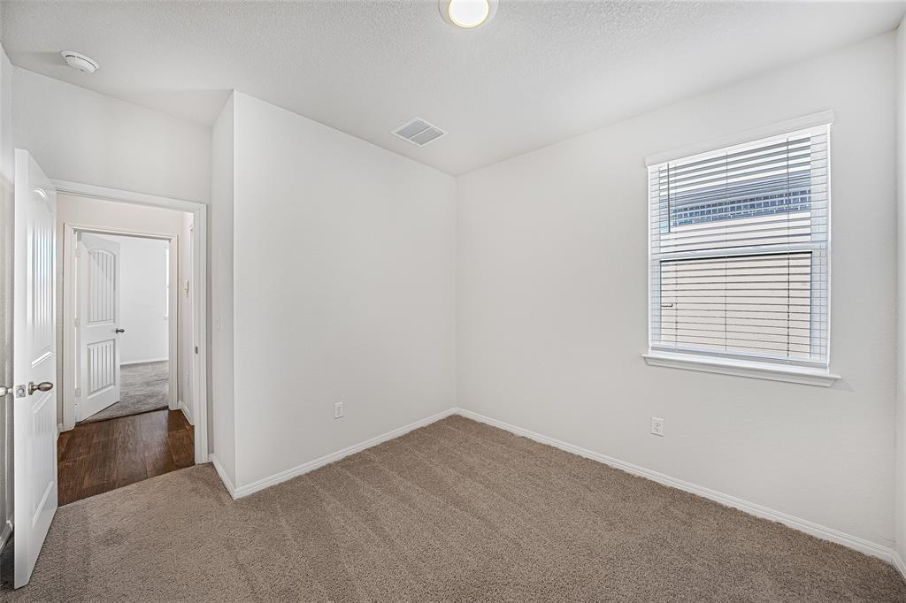 121 Mackinac Lane Georgetown, TX 78626 - Photo 13 of 16 an empty room with windows
