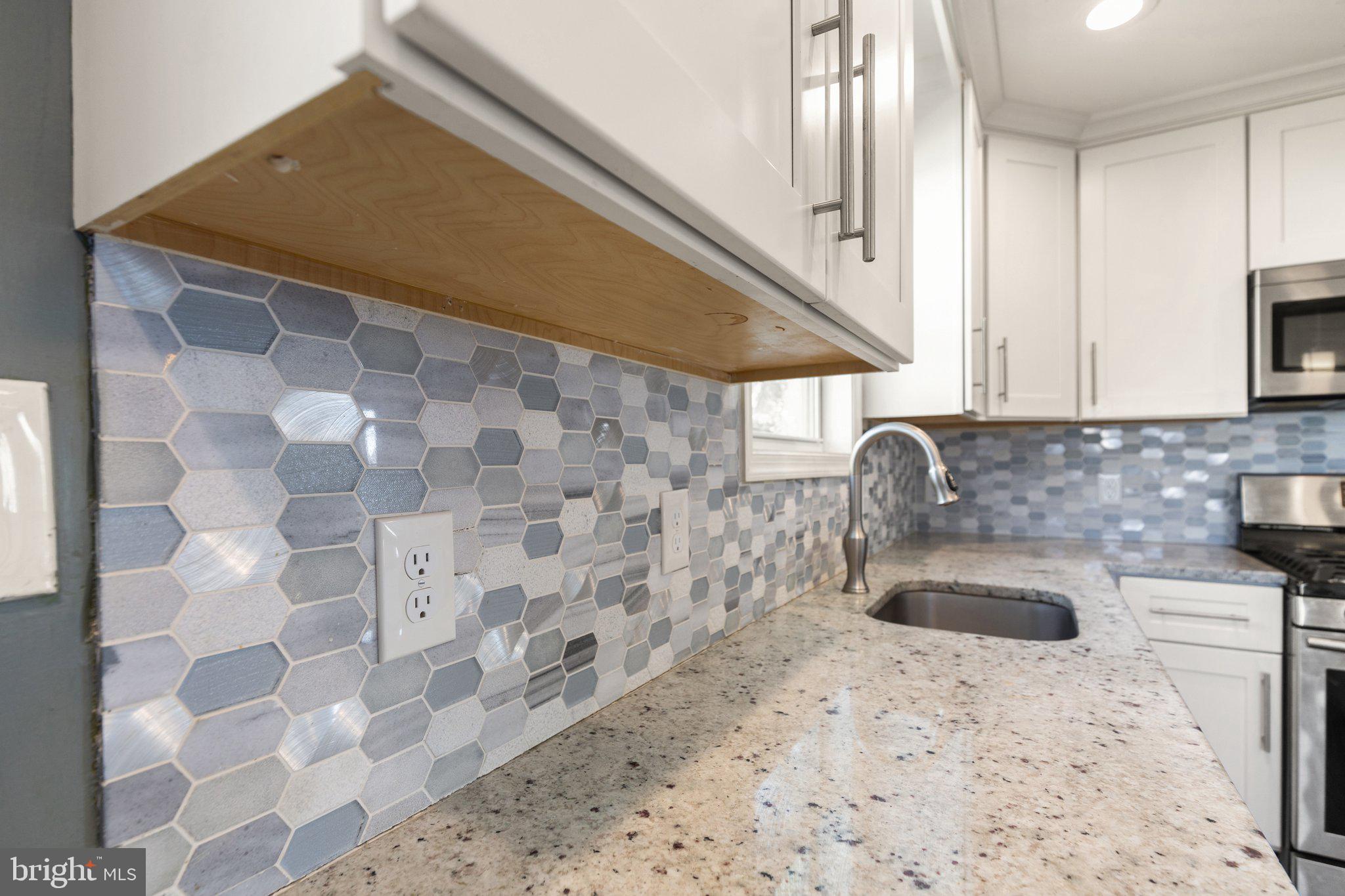 7400 Waymouth Way Baltimore, MD 21222 - Photo 12 of 27 Tiled Backsplash