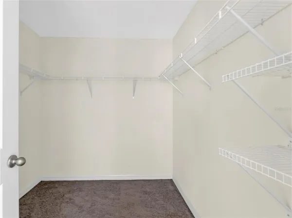 an aerial view of a house with a ocean view