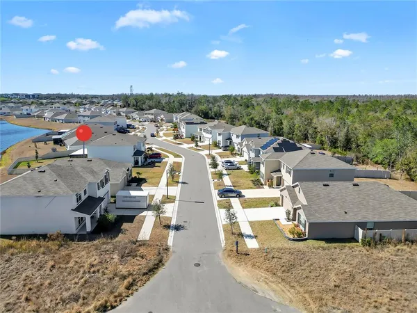 an aerial view of a building with outdoor space