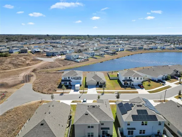 an aerial view of a building with outdoor space
