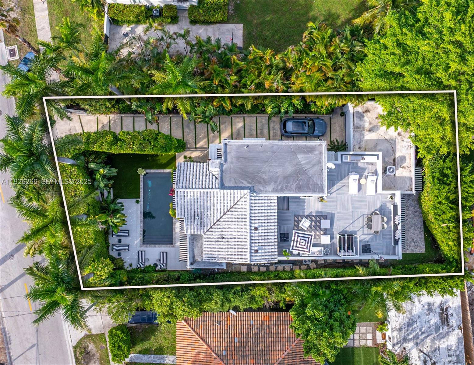 2729 North Bay Road Miami Beach, FL 33140 - Photo 12 of 41 a balcony with lots of green space