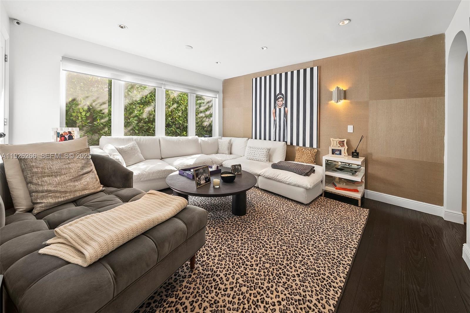 2729 North Bay Road Miami Beach, FL 33140 - Photo 23 of 41 a living room with furniture and a large window