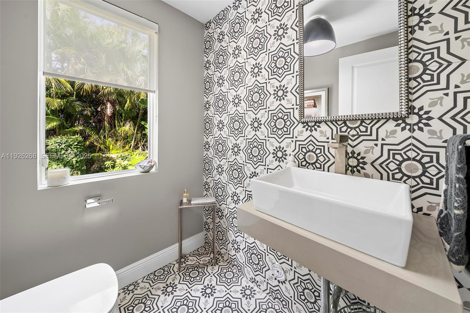 2729 North Bay Road Miami Beach, FL 33140 - Photo 34 of 41 a bathroom with a toilet and a bathtub