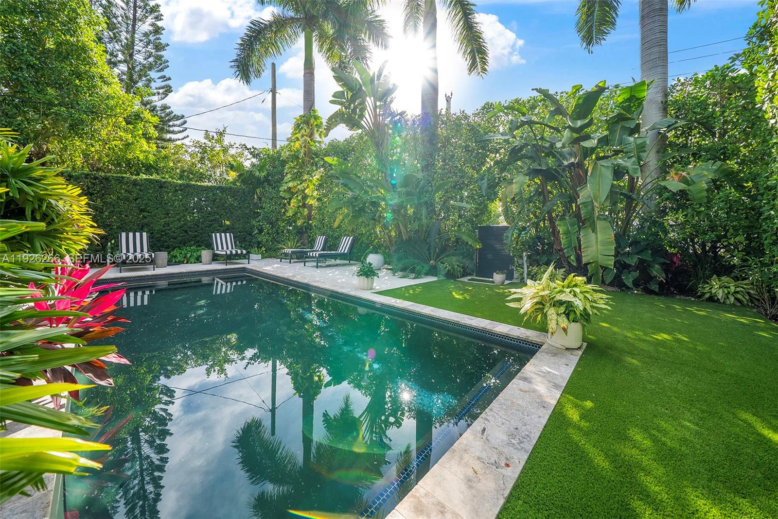 2729 North Bay Road Miami Beach, FL 33140 - Photo 38 of 41 a view of a golf course with swimming pool