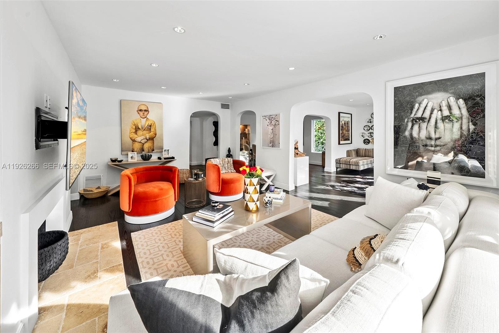 2729 North Bay Road Miami Beach, FL 33140 - Photo 4 of 41 a living room with furniture and a flat screen tv