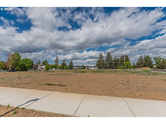 a view of a lake with a big yard