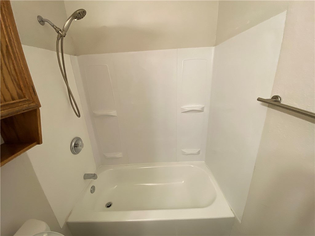913 Strom Road Corpus Christi, TX 78418 - Photo 12 of 24 a close view of a bathtub in bathroom