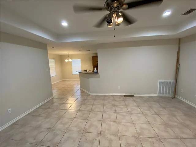 a kitchen with a sink a counter space cabinets and appliances