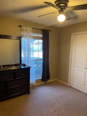a room with furniture and window