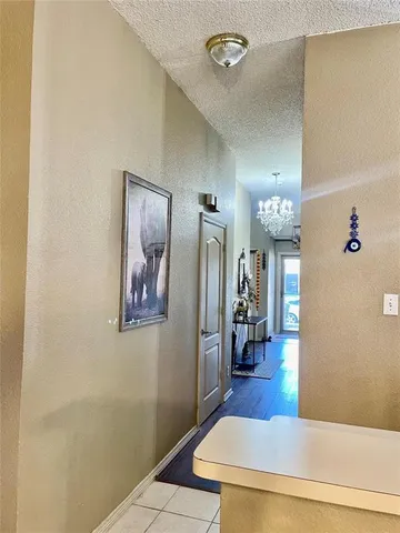 a view of a hallway with workspace