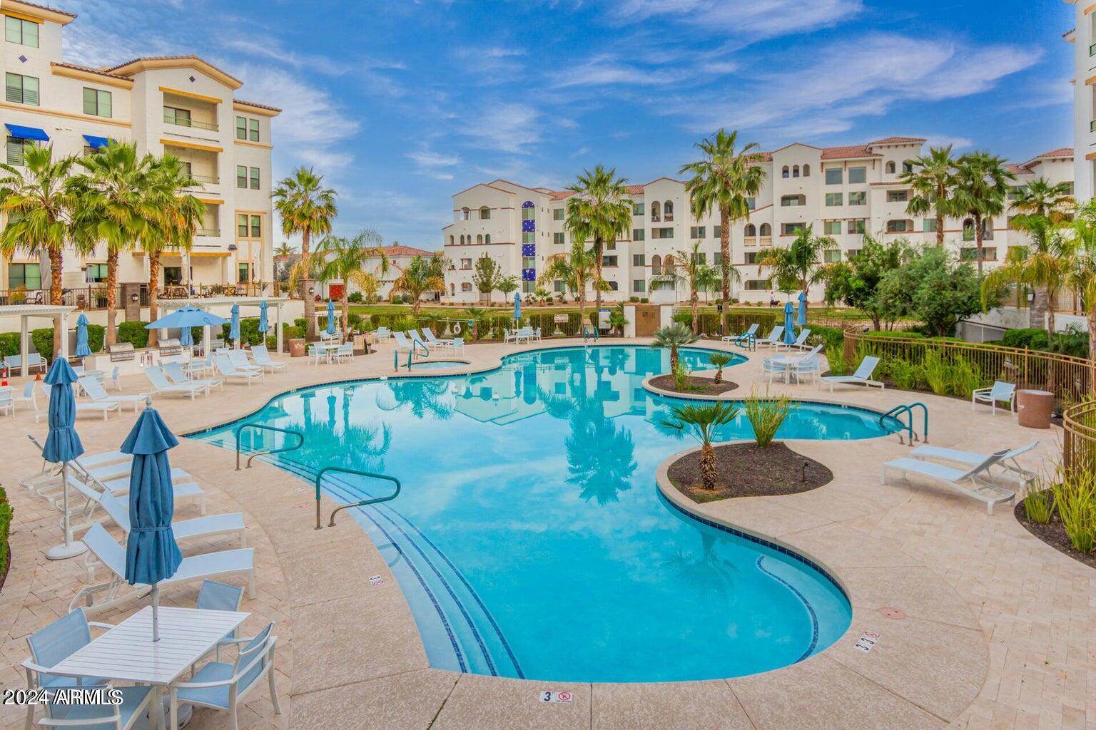 2511 West Queen Creek Road, Unit 216 Chandler, AZ 85248 - Photo 33 of 53 Cays Heated Pool