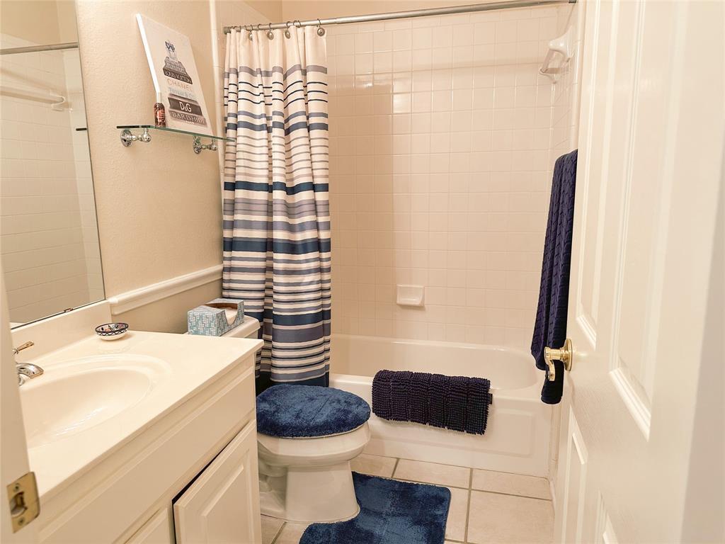 11616 Sweet Basil Court Austin, TX 78726 - Photo 15 of 18 a bathroom with a sink and a mirror