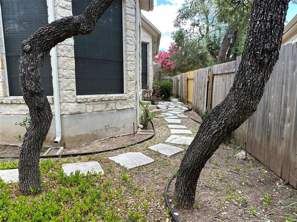 11616 Sweet Basil Court Austin, TX 78726 - Photo 18 of 18 a view of yard with patio