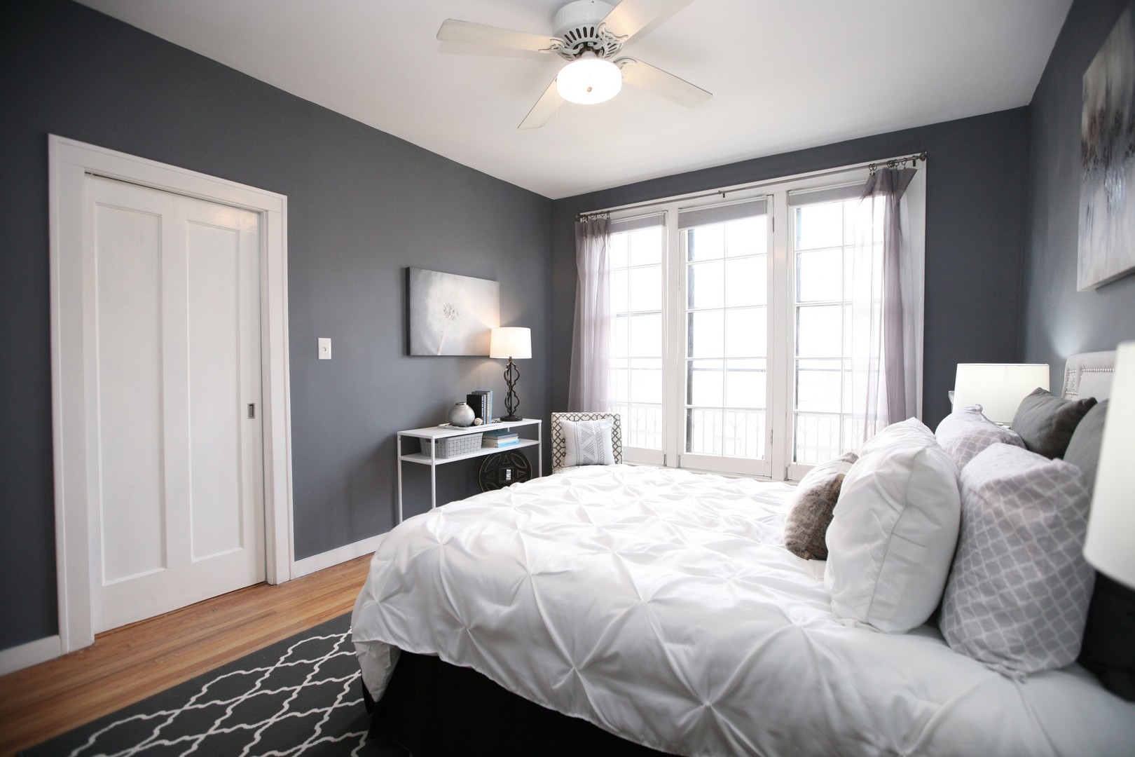 438 West Surf Street, Unit 3B Chicago, IL 60657 - Photo 12 of 36 a bedroom with a bed and a window