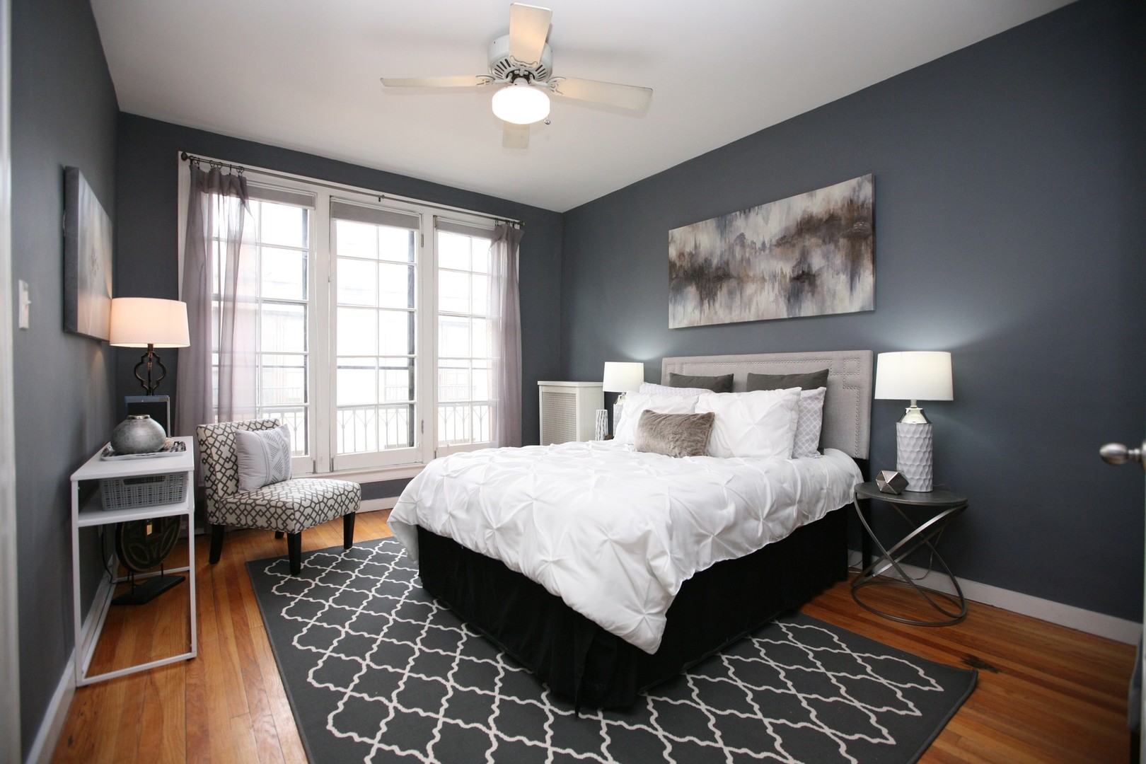 438 West Surf Street, Unit 3B Chicago, IL 60657 - Photo 9 of 36 a bedroom with a bed and a window