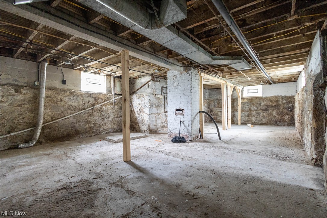 11838 Triskett Road Cleveland, OH 44111 - Photo 17 of 20 Basement featuring a healthy amount of sunlight