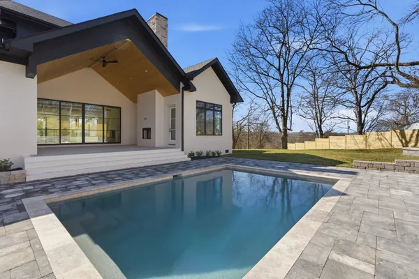 a view of a house with a swimming pool