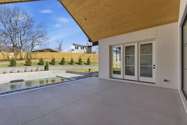 a view of an outdoor space with swimming pool