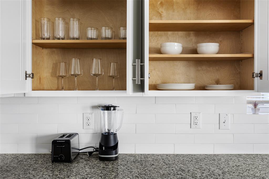 5006 Colonial Avenue Dallas, TX 75215 - Photo 11 of 25 a kitchen with a sink and cabinets