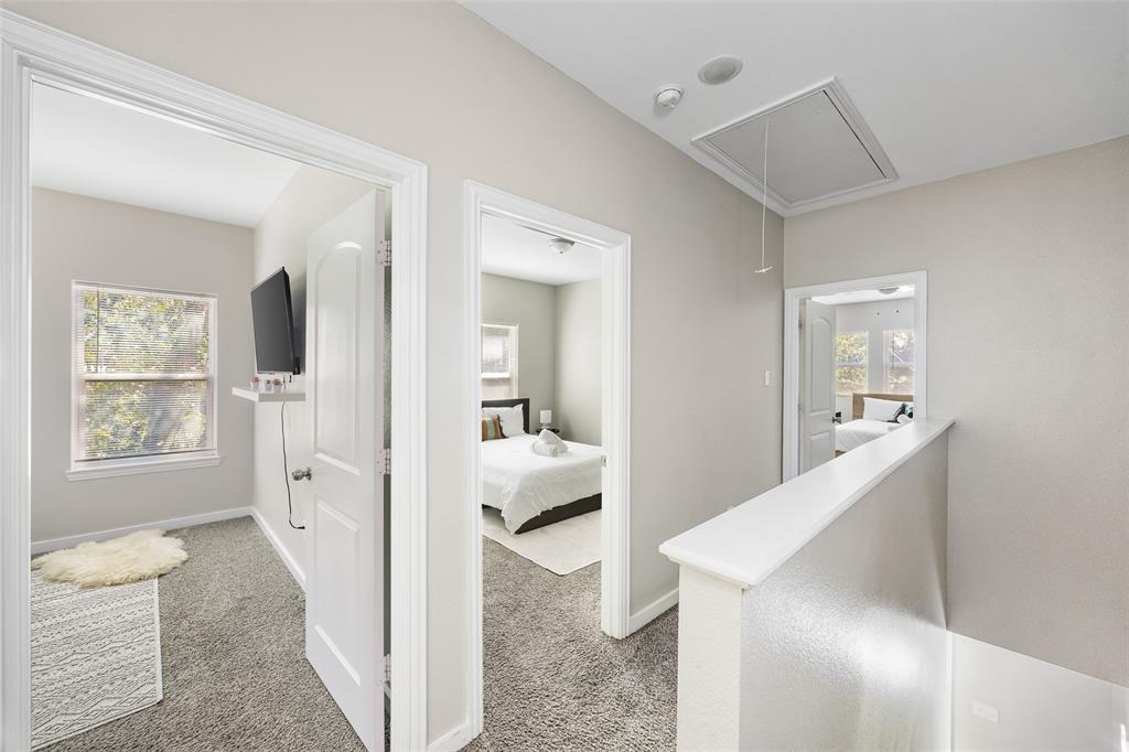 5006 Colonial Avenue Dallas, TX 75215 - Photo 14 of 25 a view of living room and bedroom with windows