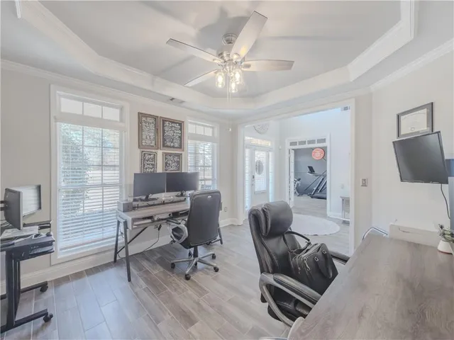 a living room with a fireplace and a fireplace