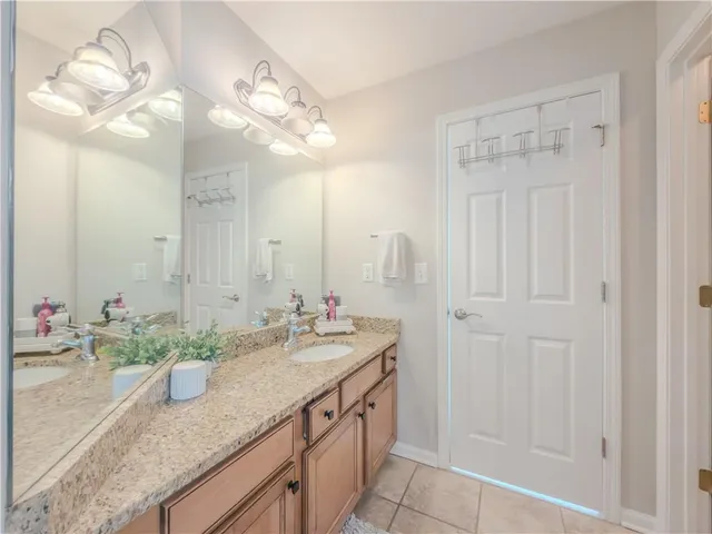 a bedroom with a bed and closet