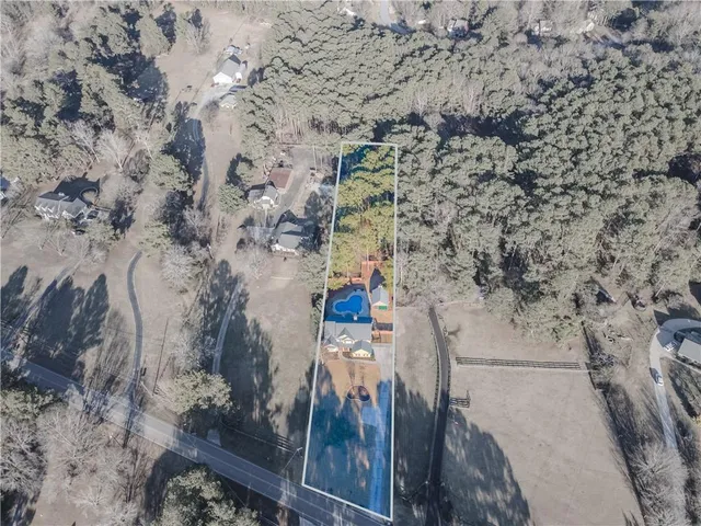 a room with gym equipment and a large window