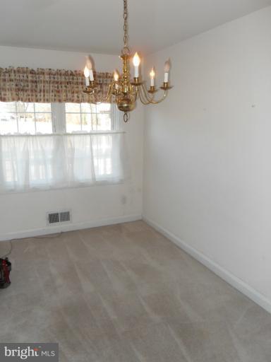 2239 Firethorn Road Middle River, MD 21220 - Photo 1 of 21 a view of a chandelier in big room