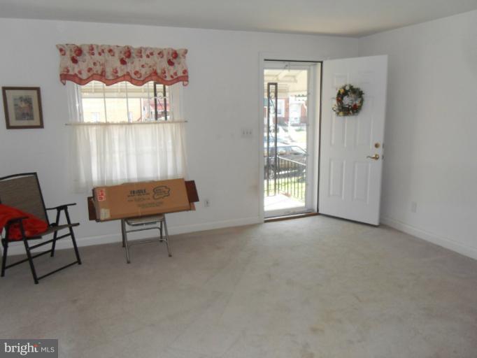 2239 Firethorn Road Middle River, MD 21220 - Photo 14 of 21 a living room with furniture and a window