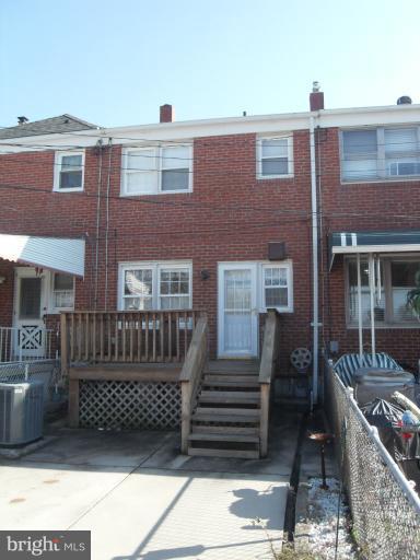 2239 Firethorn Road Middle River, MD 21220 - Photo 20 of 21 a view of a brick house with many windows