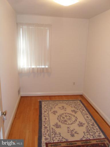 2239 Firethorn Road Middle River, MD 21220 - Photo 5 of 21 wooden floor in a empty room