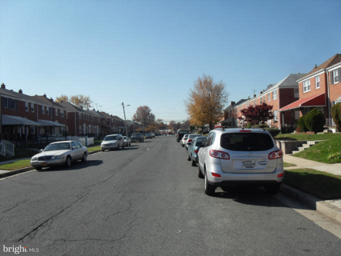 2239 Firethorn Road Middle River, MD 21220 - Photo 7 of 21 a view of street with parked cars