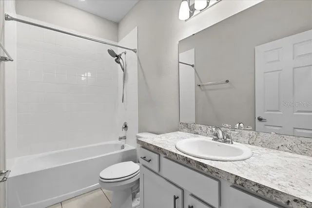 a view of a house with yard