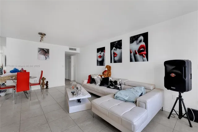 a living room with furniture and couch