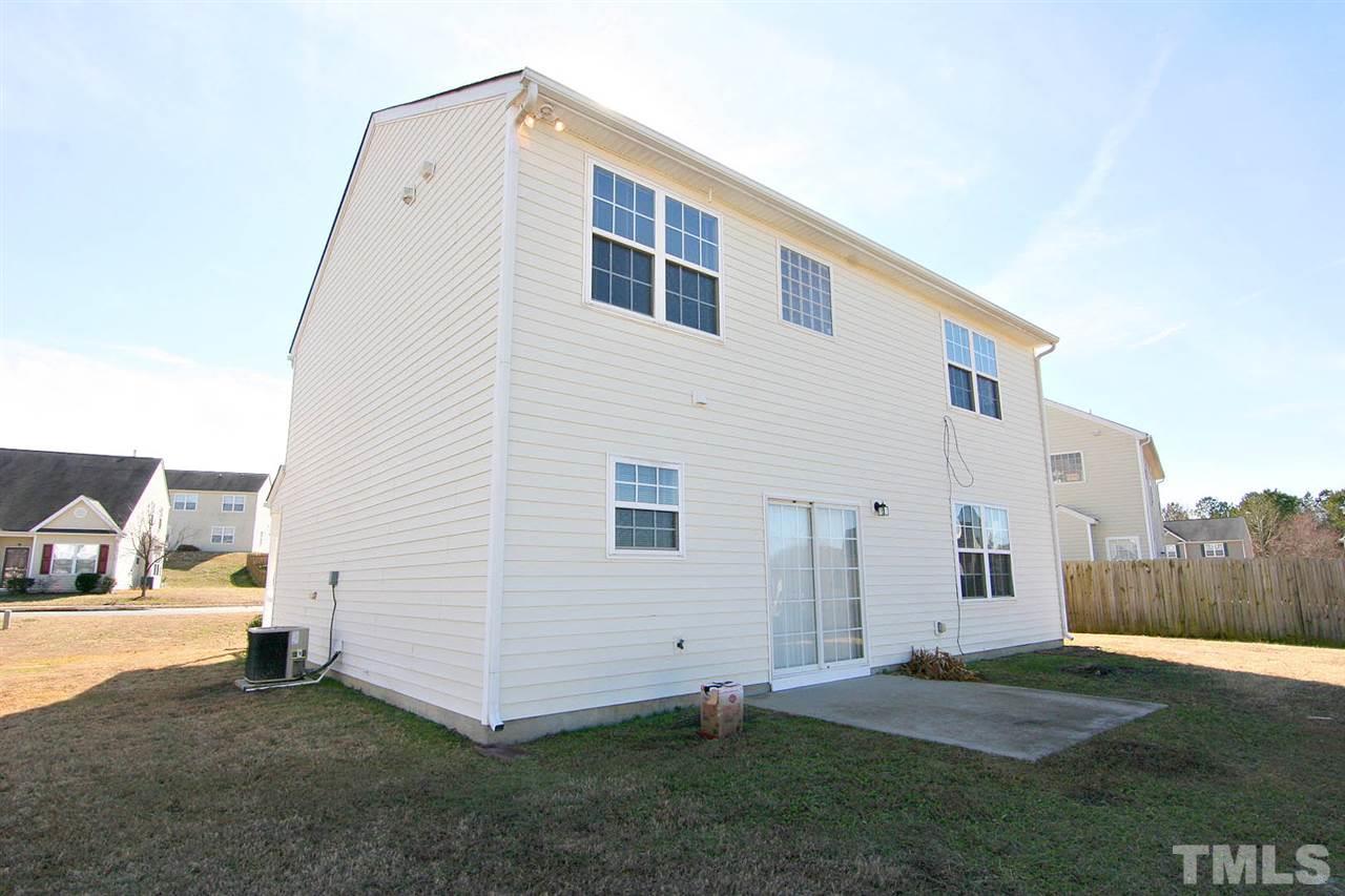 7009 Spanglers Spring Way Raleigh, NC 27610 - Photo 22 of 25 a view of a house with backyard