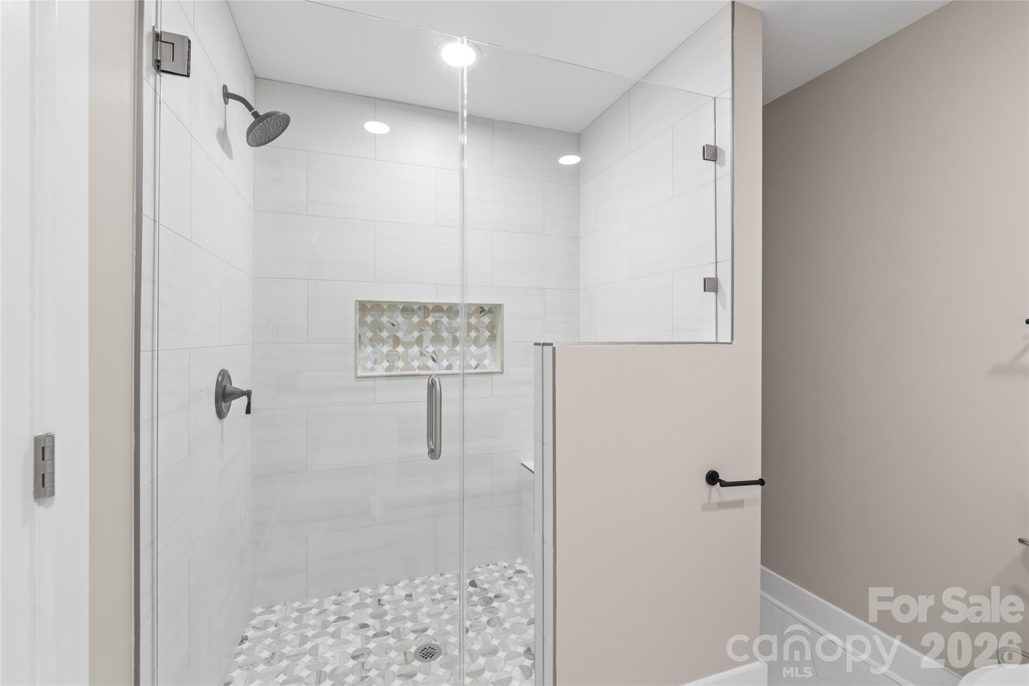11956 Sam Black Road Midland, NC 28107 - Photo 11 of 23 a bathroom with a shower and a sink