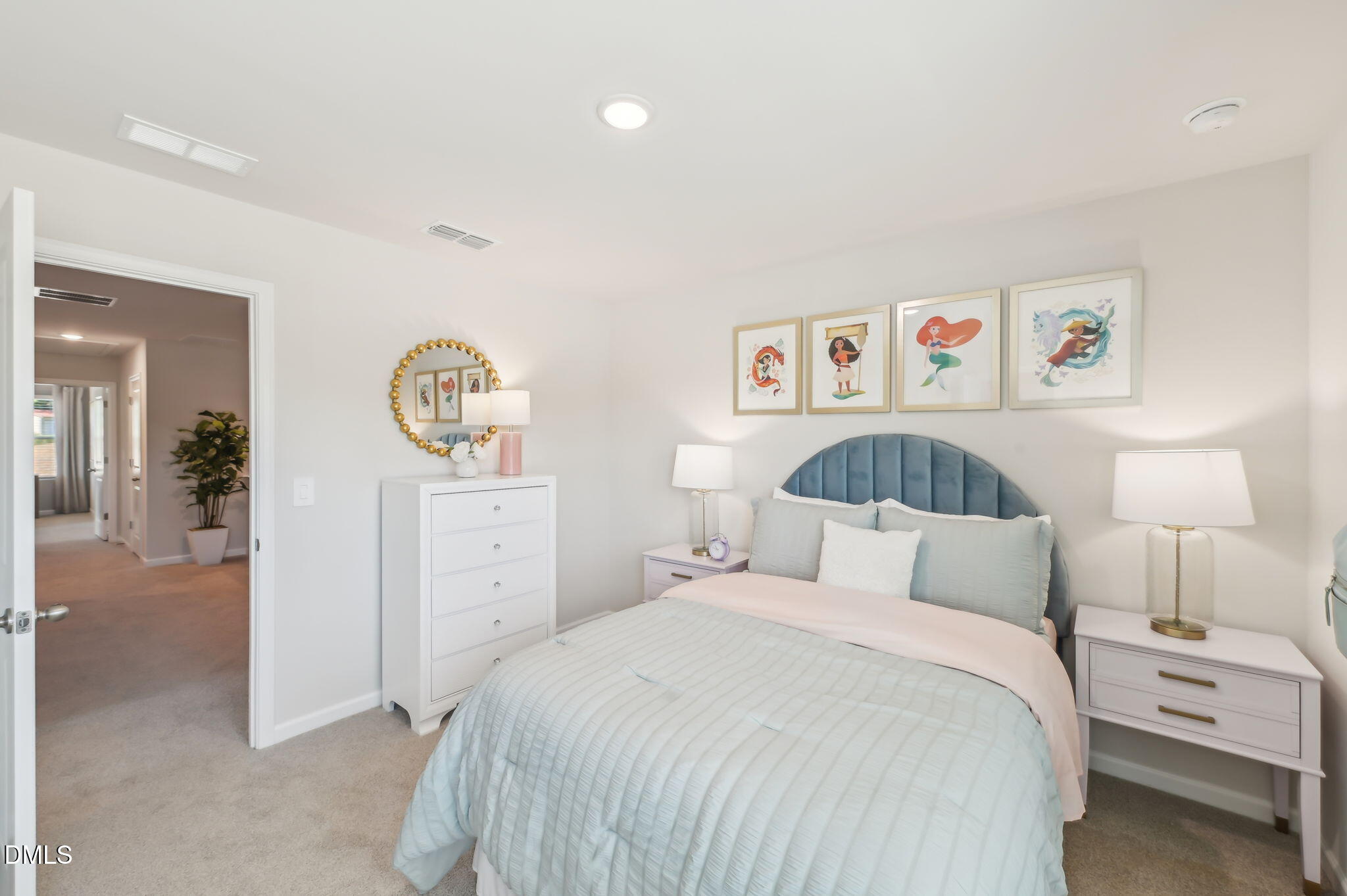 924 Broadleaf Trace Mebane, NC 27302 - Photo 22 of 26 a bedroom with a bed and a lamp